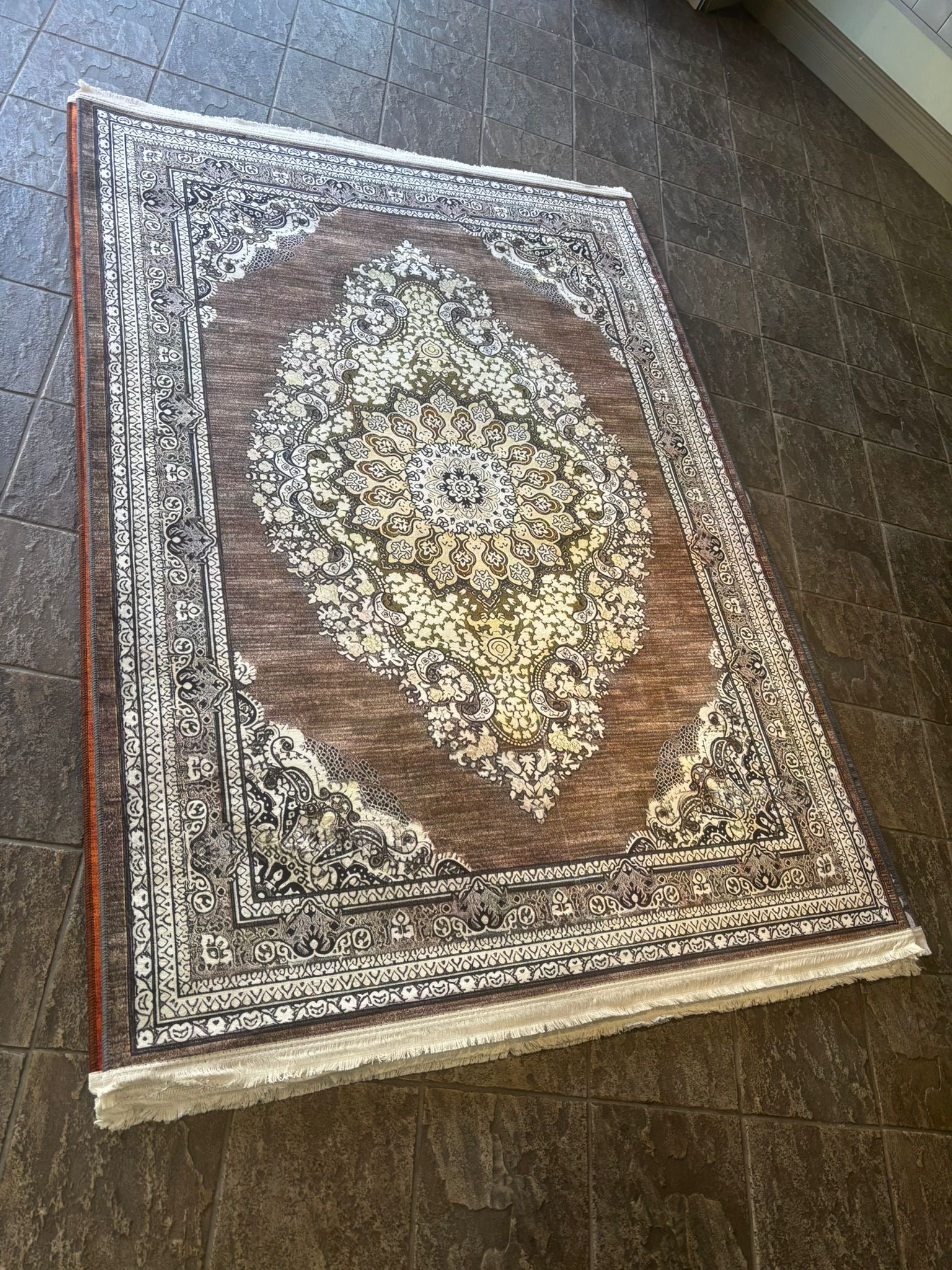 Brown Persian prayer rug from current stock
