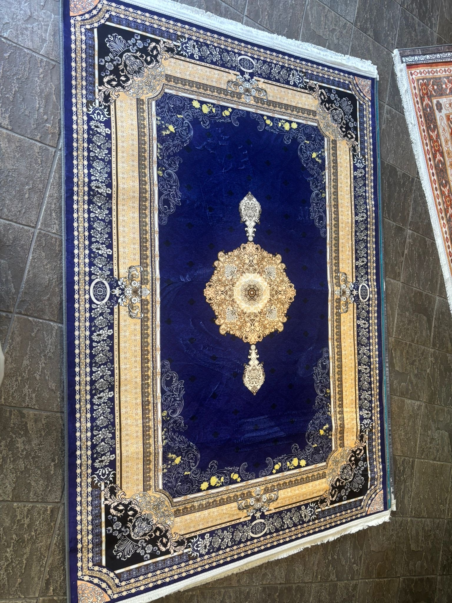 Navy and gold prayer rug from current stock