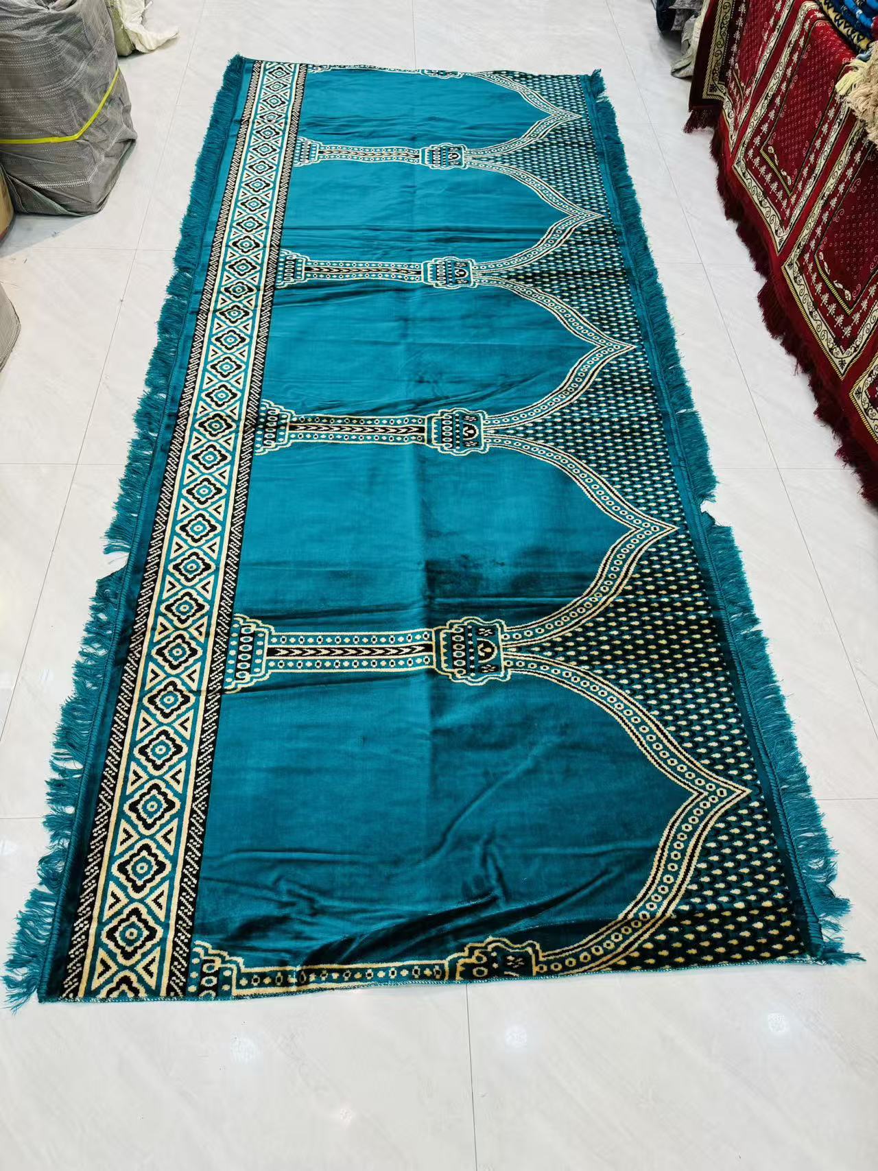 Teal multi-person prayer rug from current stock